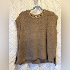 New without tags. Sleeveless sweater. Size medium.